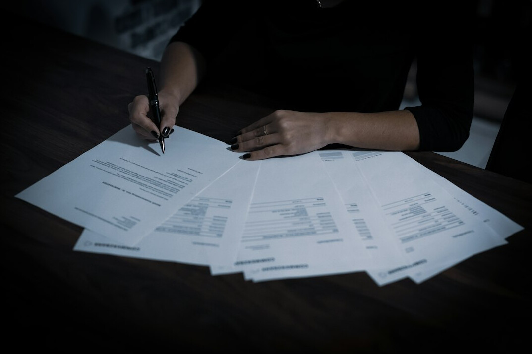 person reviewing documents