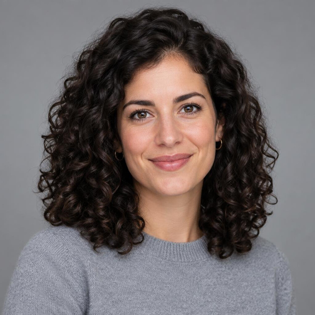 Studio portrait of a young Portuguese woman, data journalist
